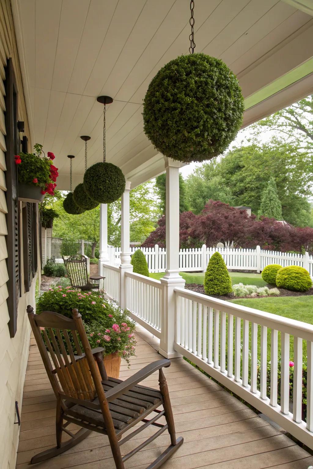 Hanging topiary balls add dynamic height.