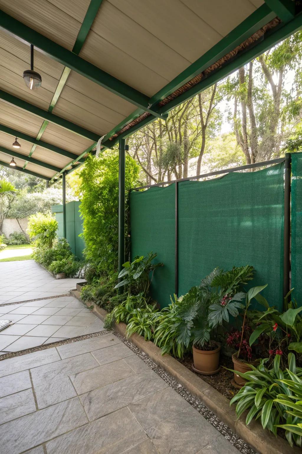 Lush greenery providing privacy on a garage patio.