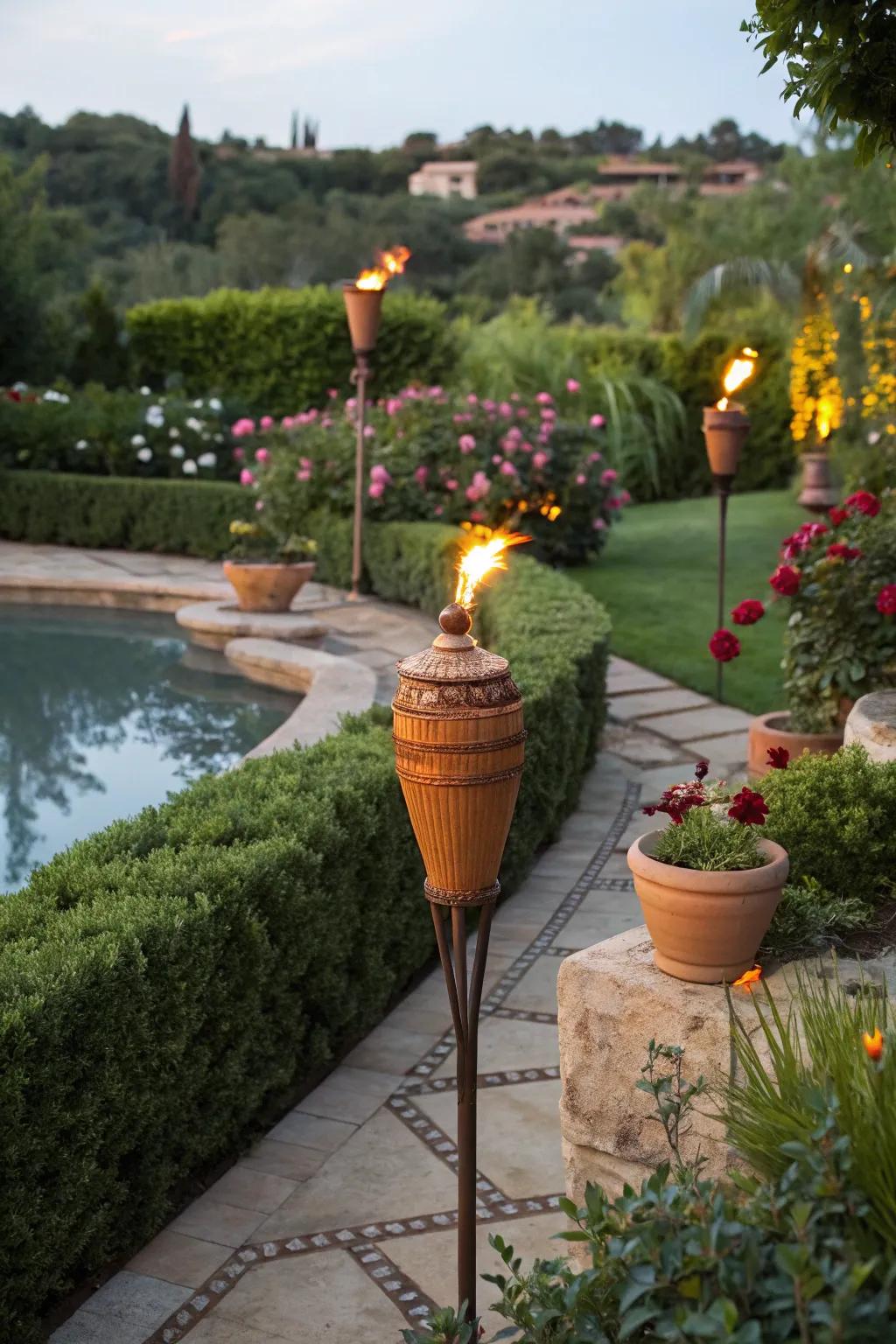 Clay pot torches add warmth and a touch of the Mediterranean to gardens.