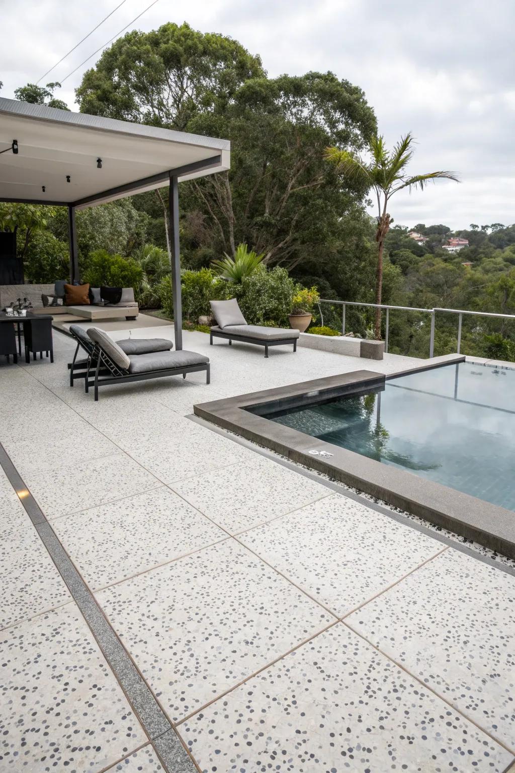 Terrazzo tiles add a modern and chic flair to your pool deck.