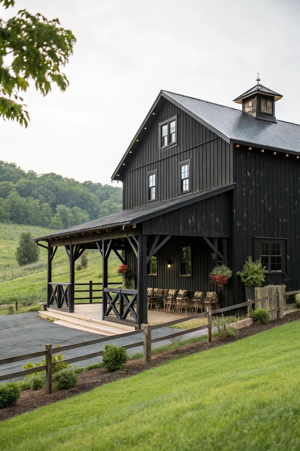 A black barn with a charming veranda wrap.