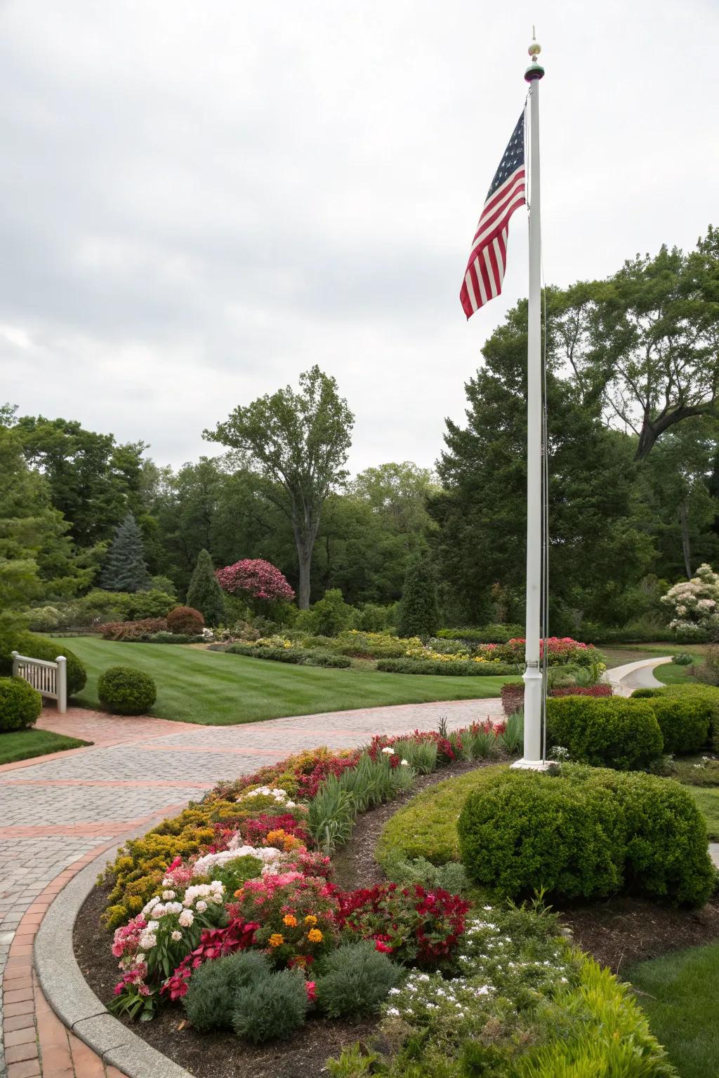 Garden art paired with a flagpole for personal expression.