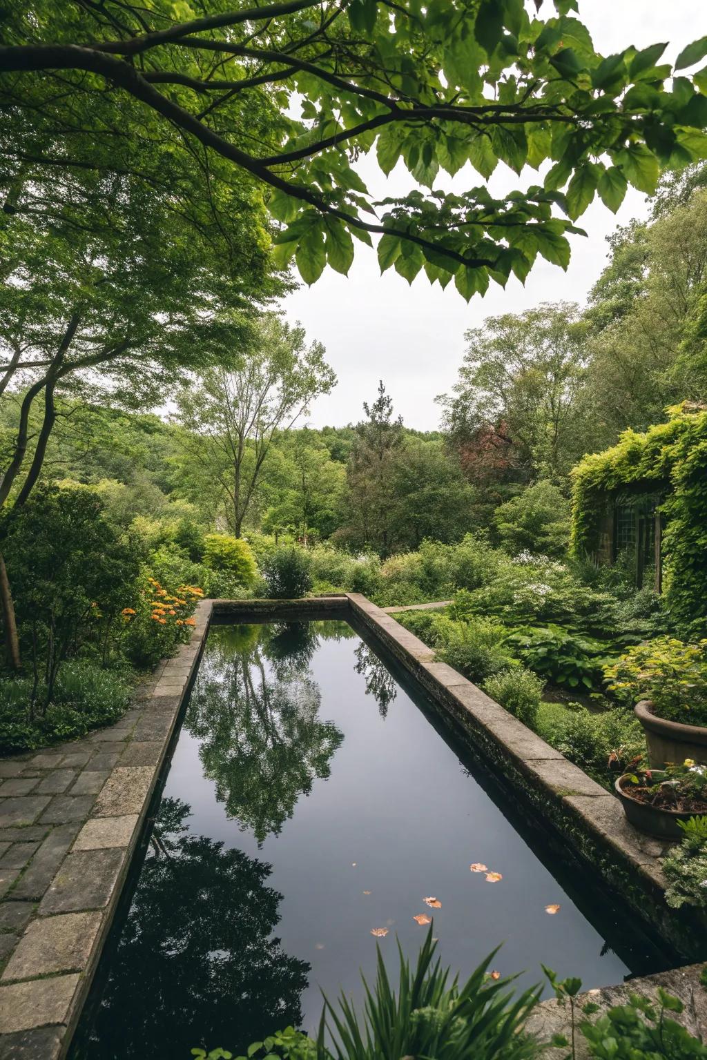 A reflecting pool adds serenity and depth to the space.