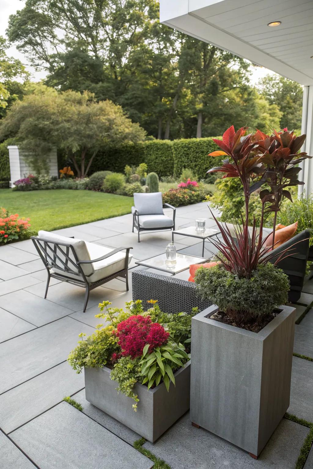 Artful planter arrangements bring color and personality to this patio.