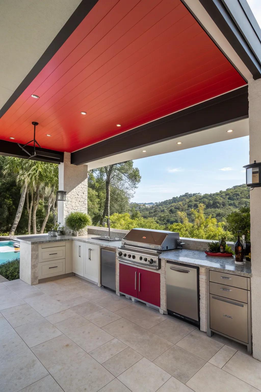 A bold-colored ceiling adds a striking statement and lively energy to this outdoor kitchen.