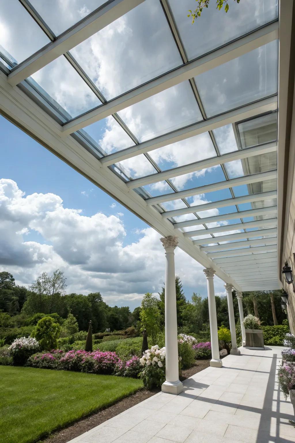 A glass roof offers elegant shelter while maintaining open sky views.