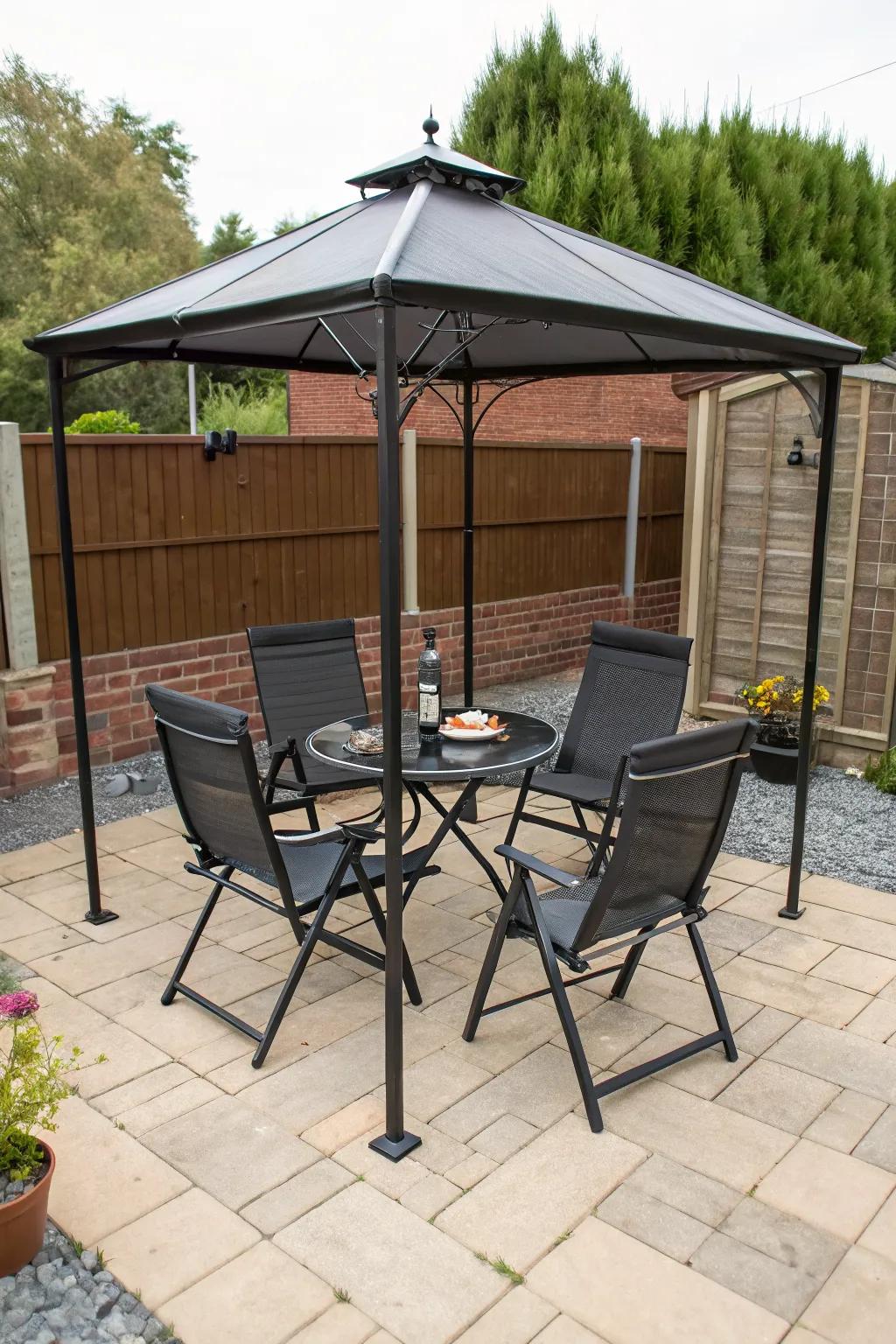Folding furniture for flexible use in a small patio gazebo.