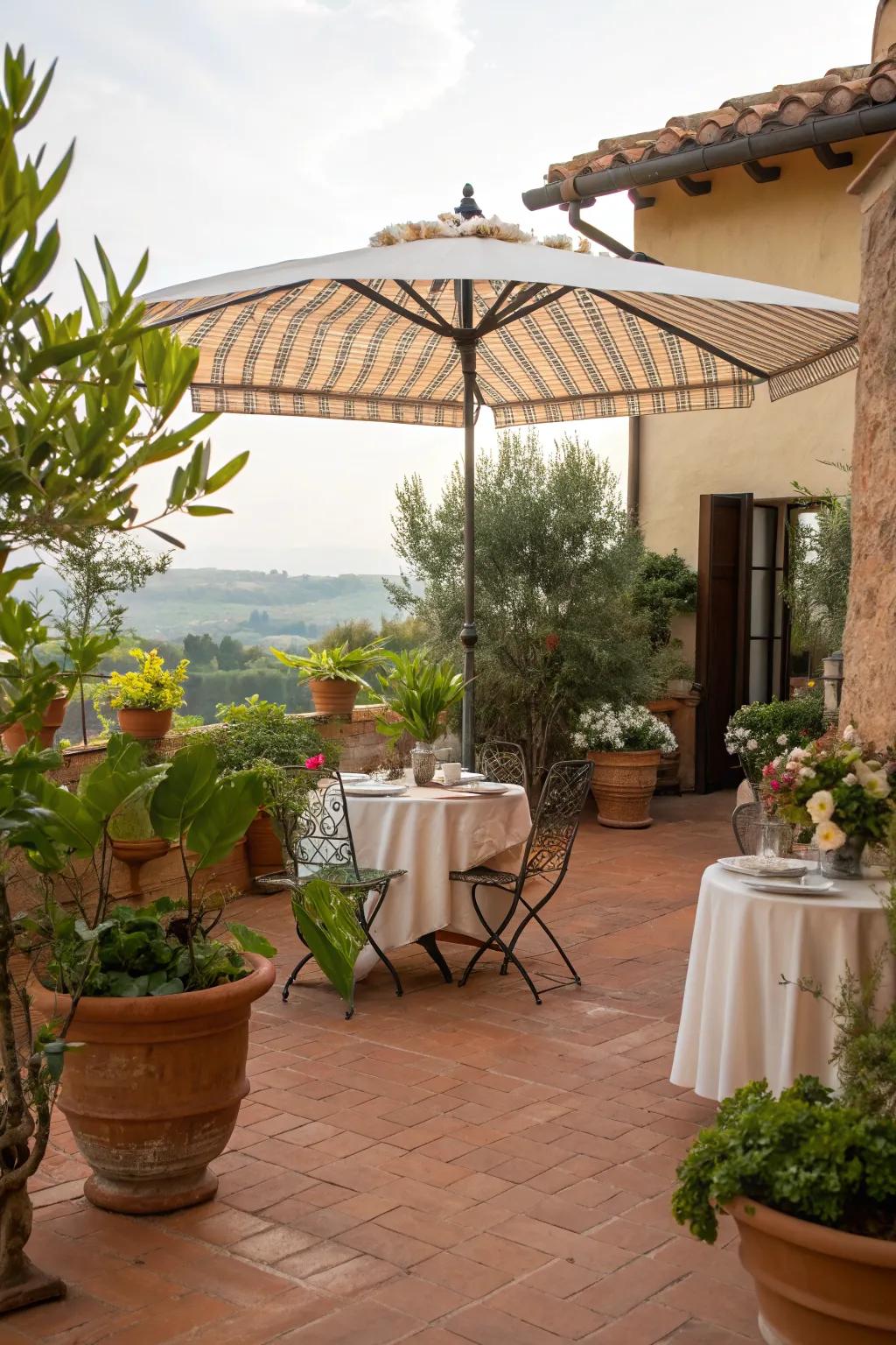 A stylish umbrella offers shade on this Tuscan patio.