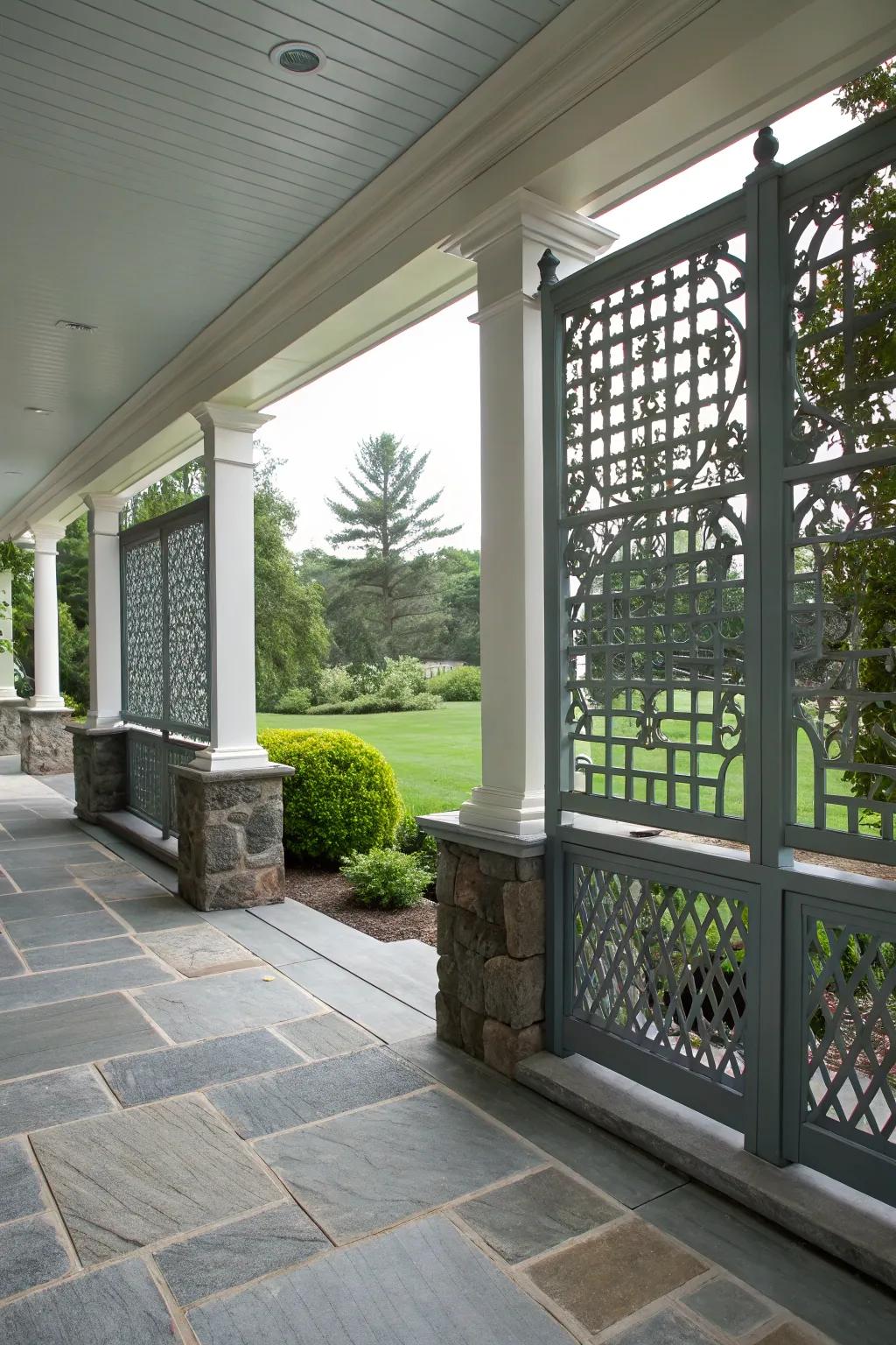 A bluestone porch with stylish privacy screens.