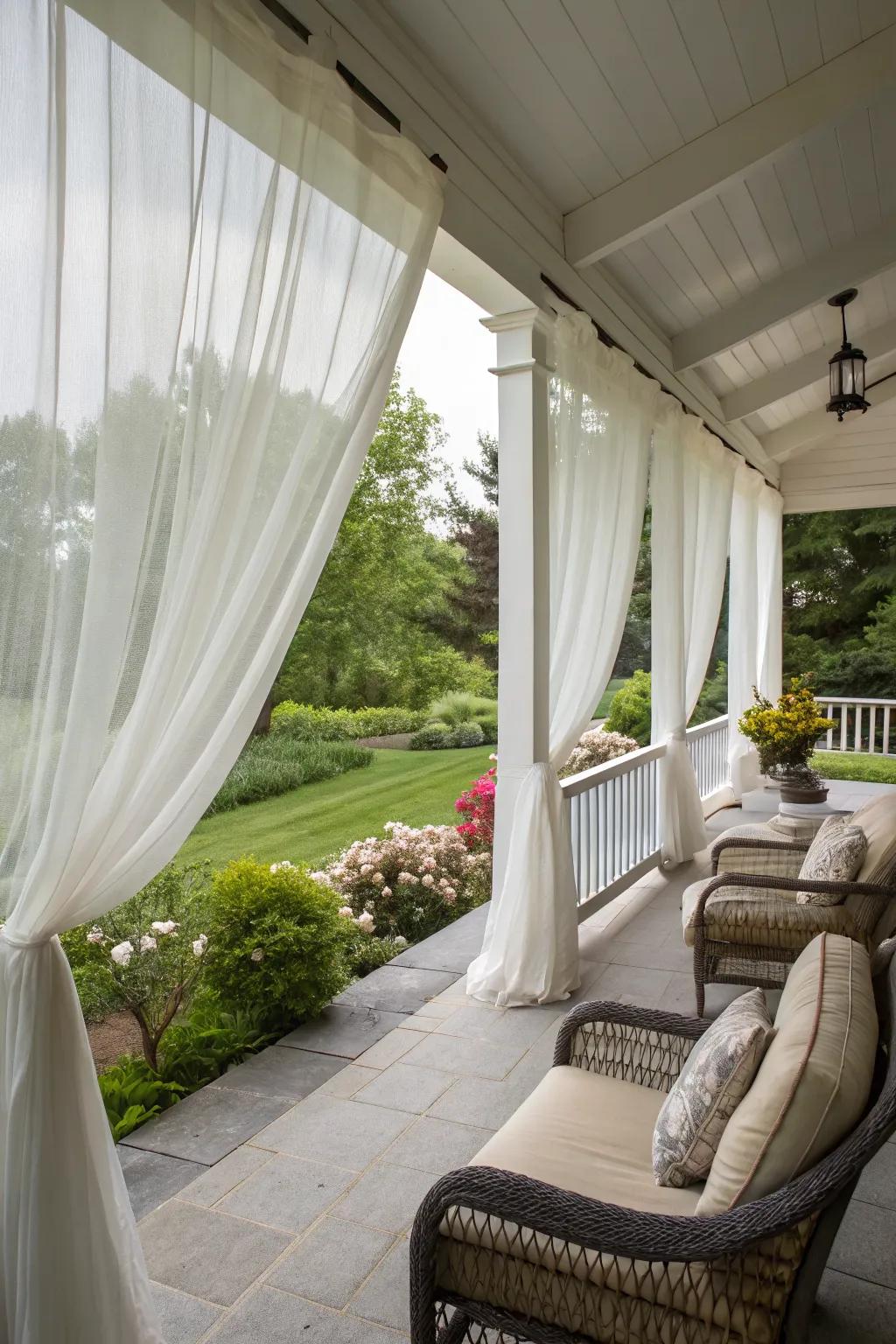 Porch curtains create a dreamy, inviting outdoor space.