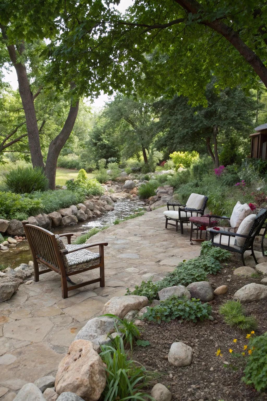 A seating area by a dry river bed offers a place for relaxation.