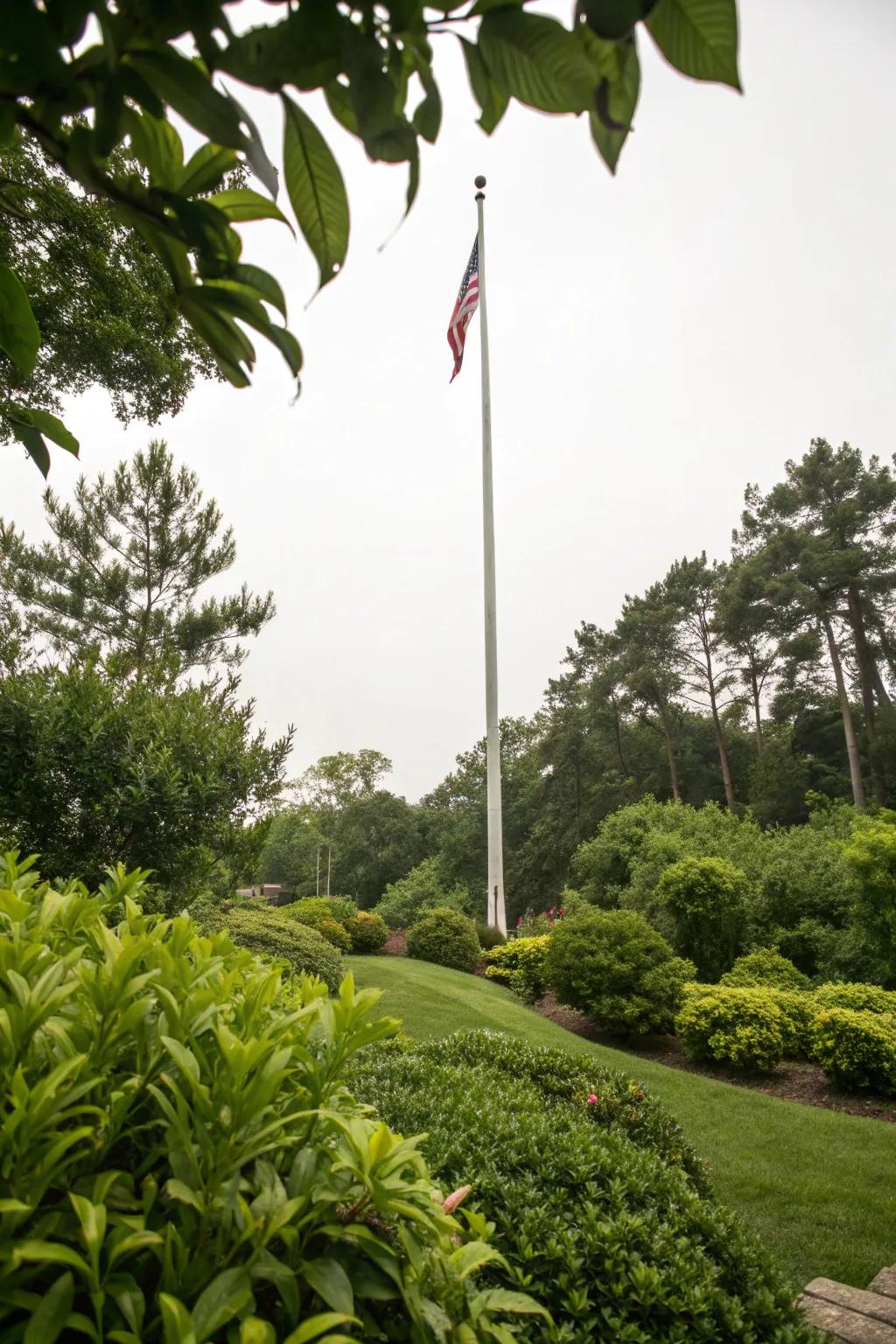 A lush embrace of greenery enhances the flagpole's appeal.