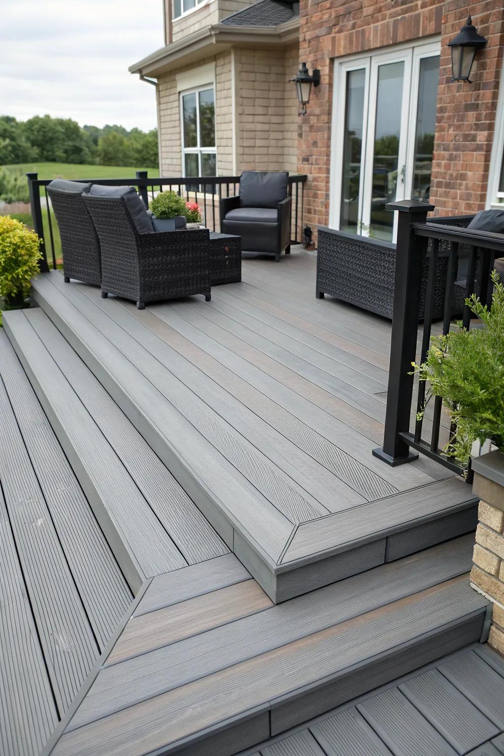 A grey deck with textured composite materials, offering visual interest and ease of maintenance.