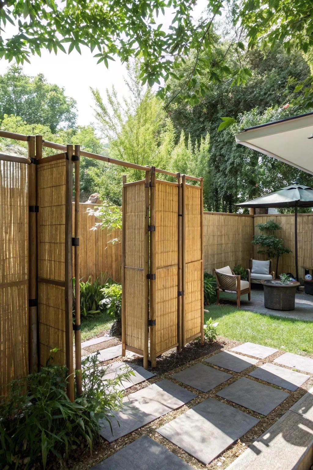 Bamboo screens providing natural shade and privacy in a cozy backyard.
