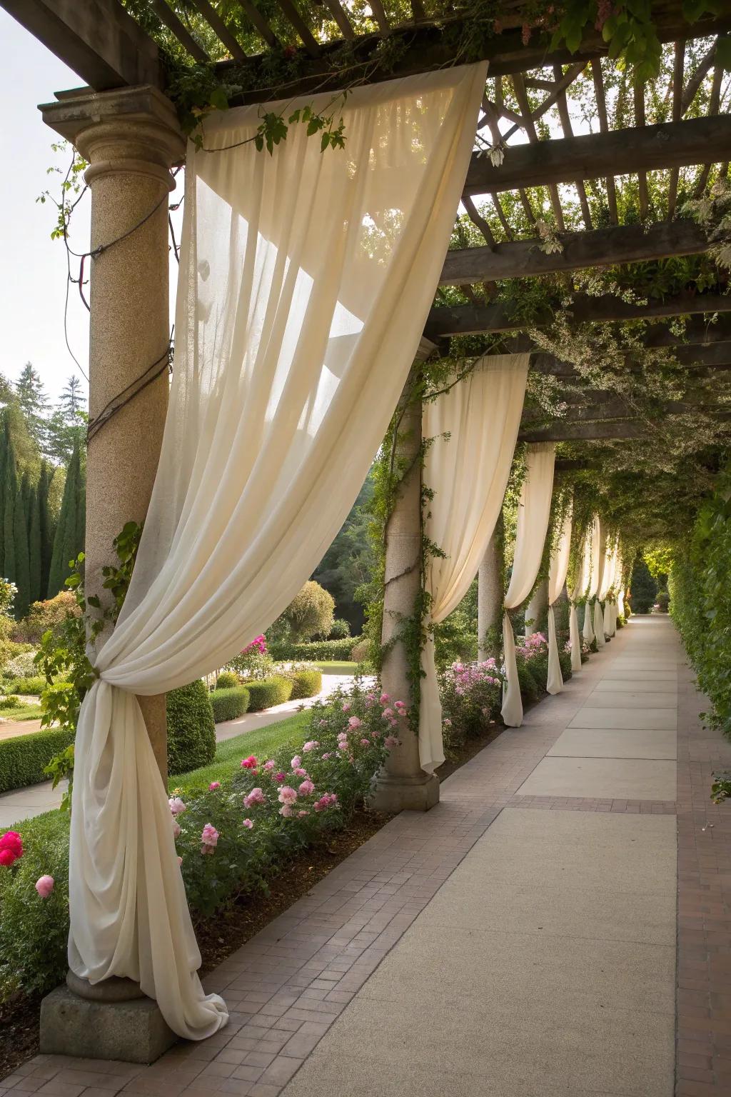 A pergola walkway offering privacy and comfort with elegant drapes.