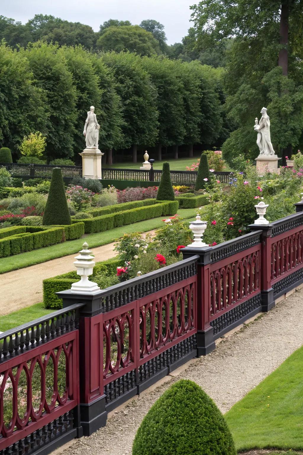Burgundy and black fence adding a regal touch to a sophisticated garden.