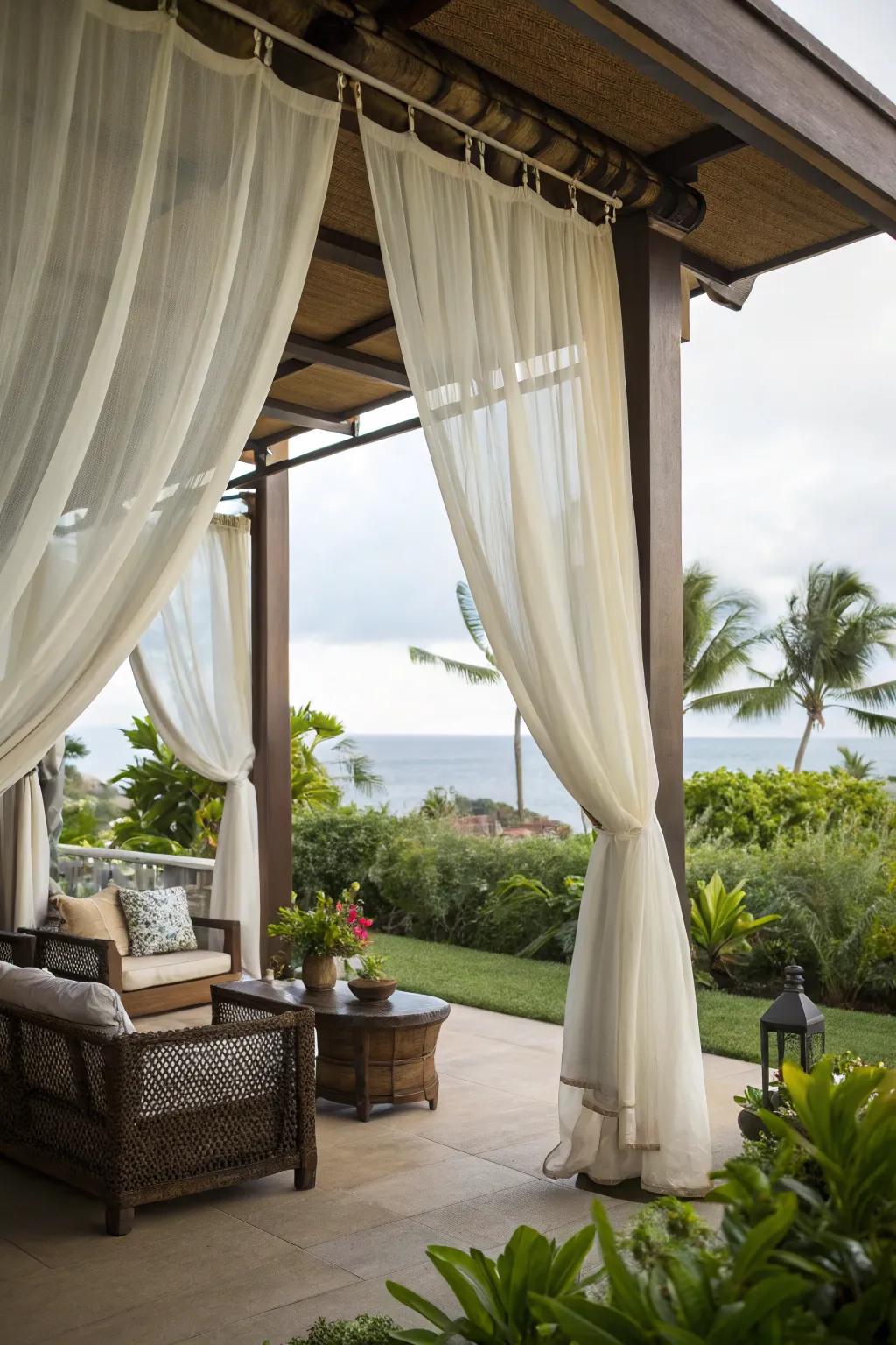 Outdoor curtains create a cozy, private lanai space.