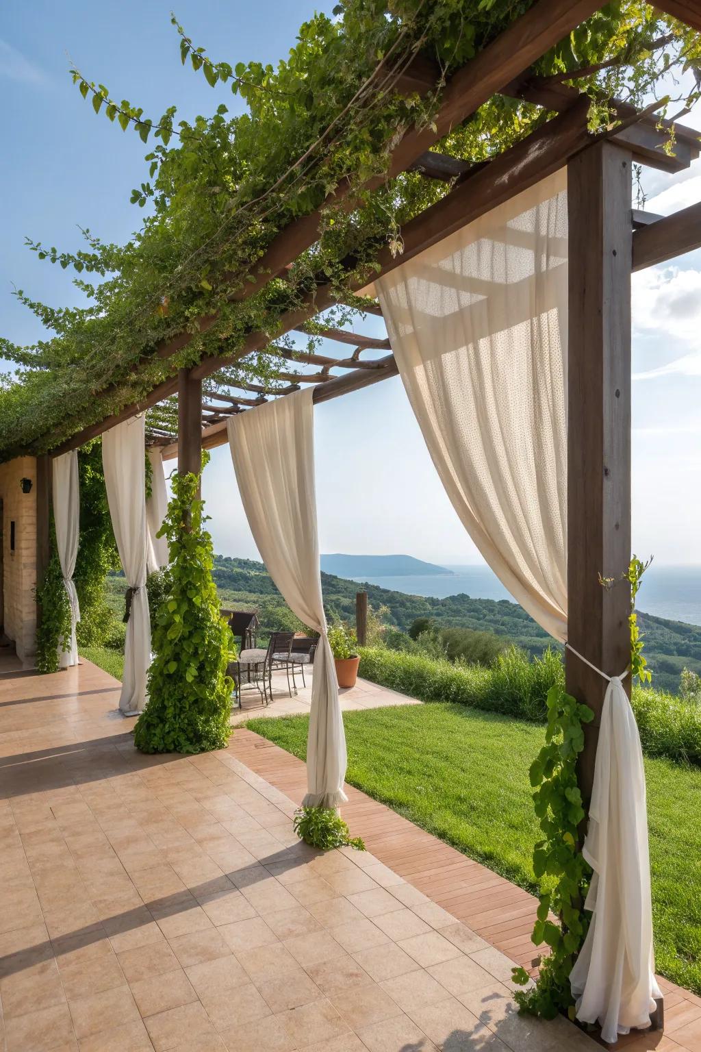 Drapes add elegance and privacy to a pergola.