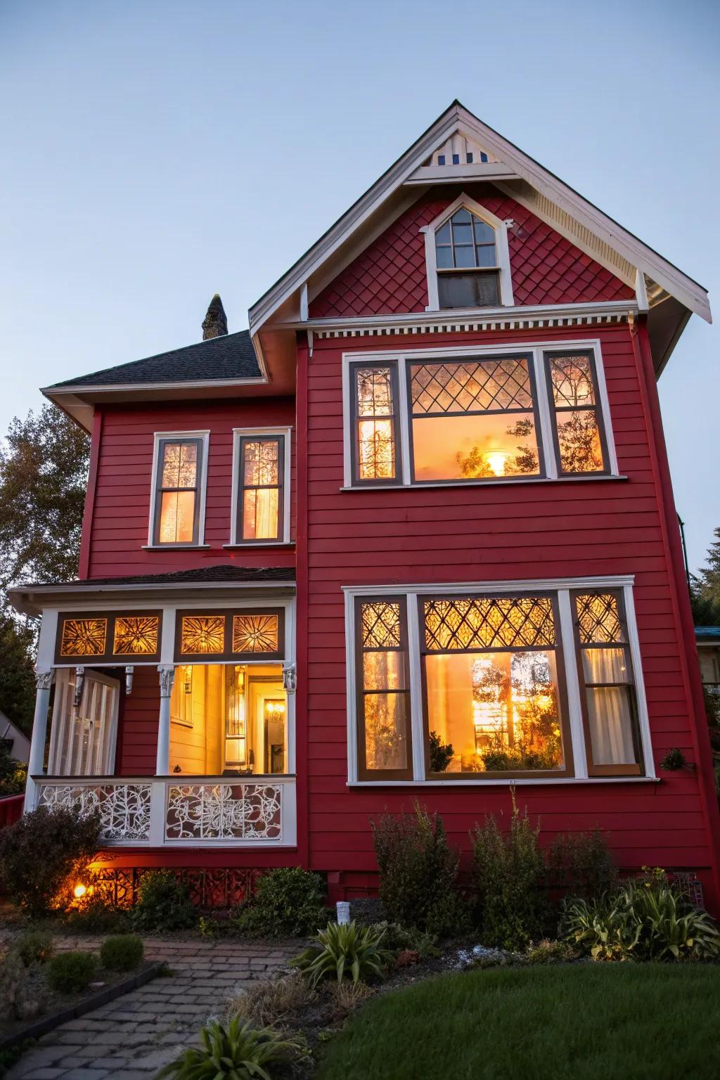Character and light with artful windows and a red exterior.