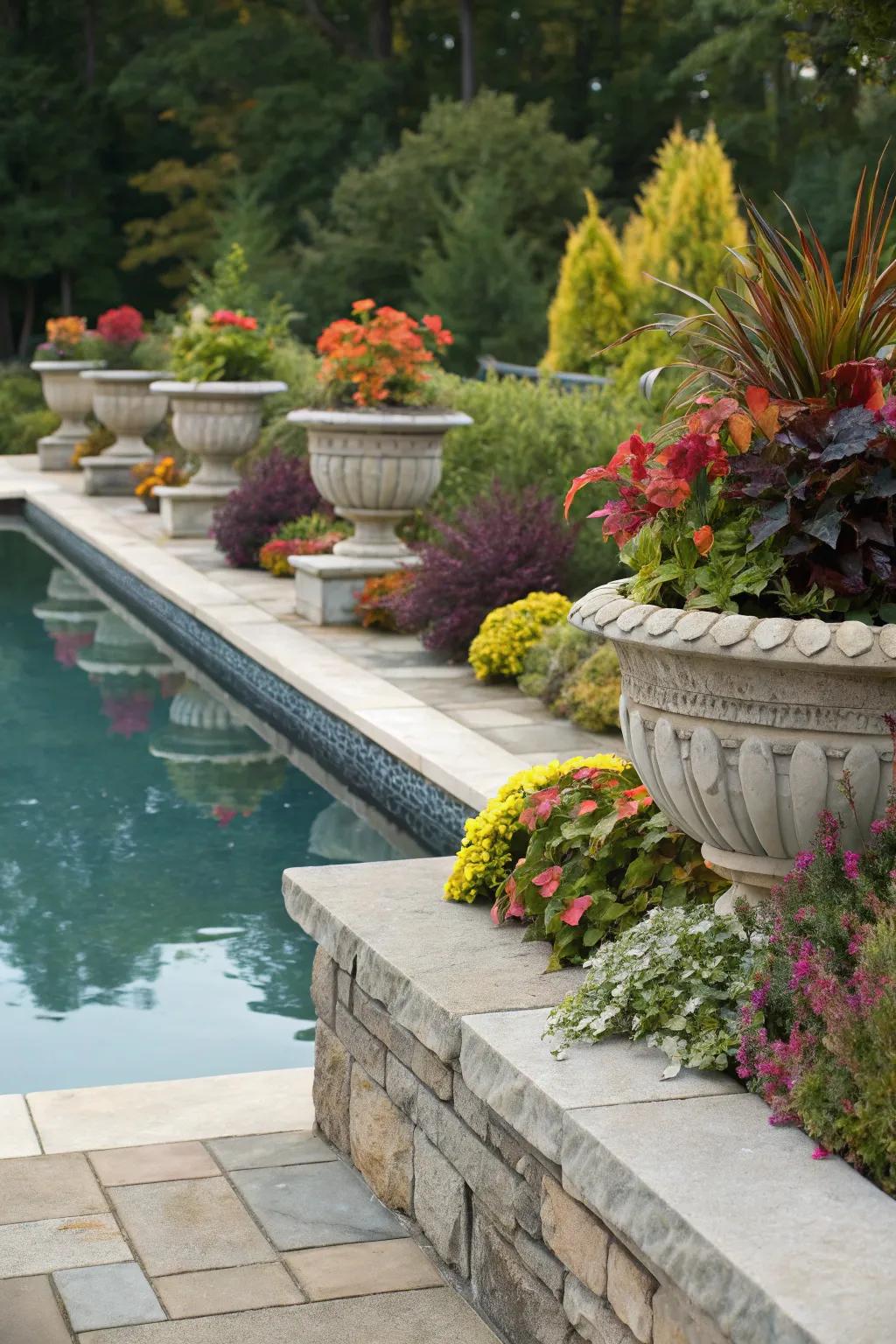 Stone-edged planters introduce lush greenery to poolside settings.