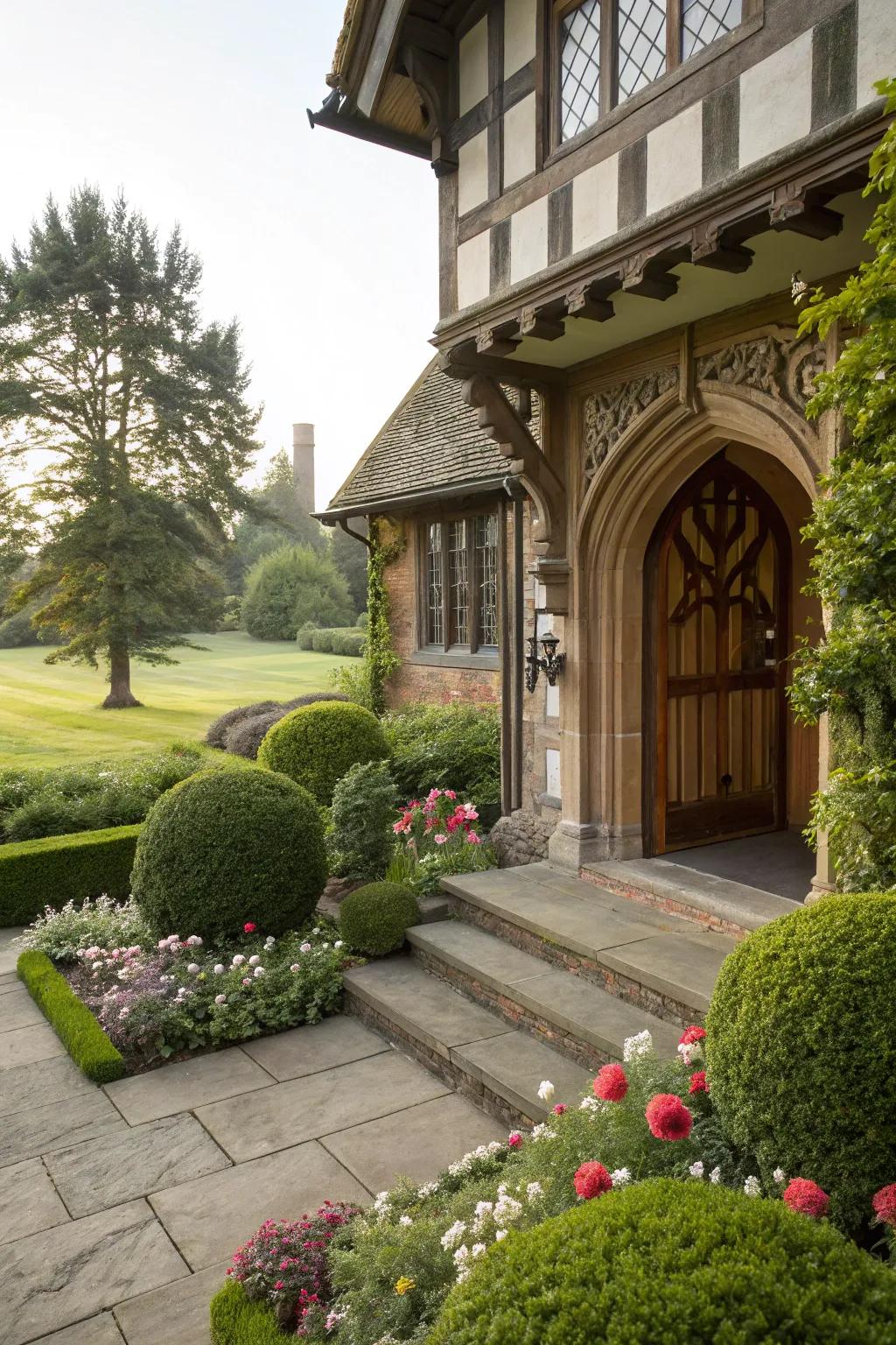 Traditional landscaping elements enhance the charm of this Tudor porch.