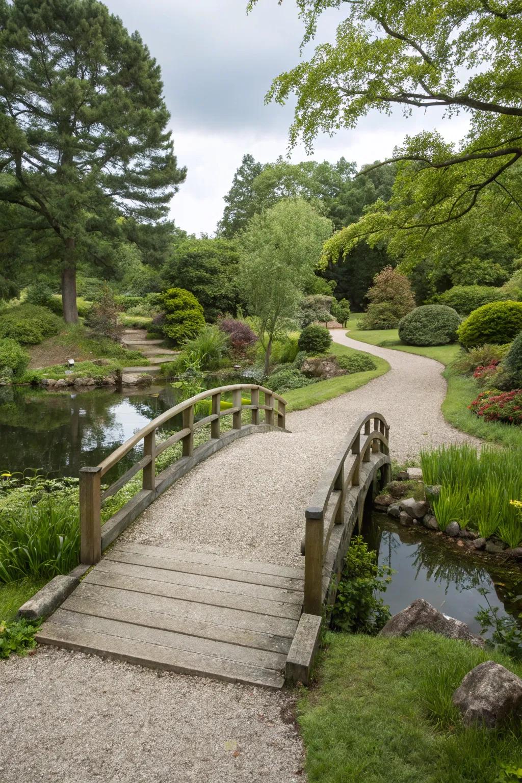 A whimsical gravel path with a wooden bridge.