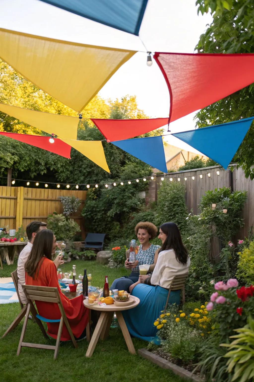 Colorful sail shades creating a festive atmosphere for a backyard garden party.