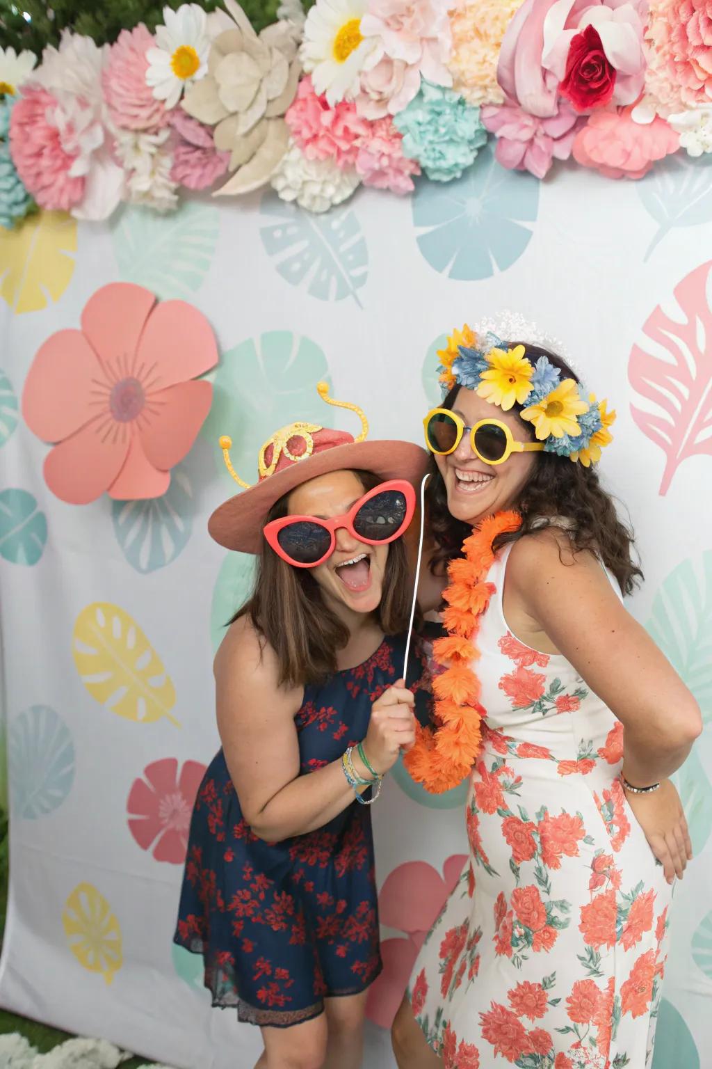A photo booth with props offers guests fun photo opportunities.