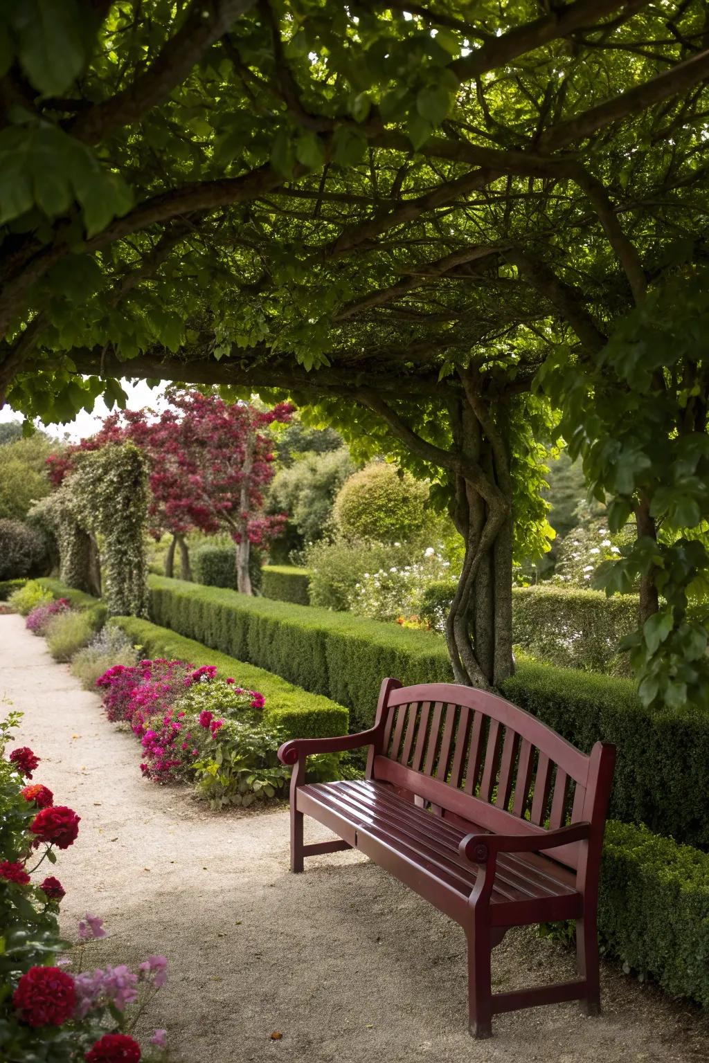 A burgundy bench adds richness and depth to a luxurious garden.