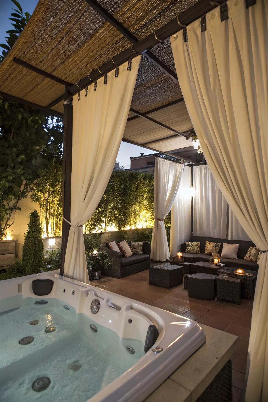 A private jacuzzi nook with elegant outdoor curtains