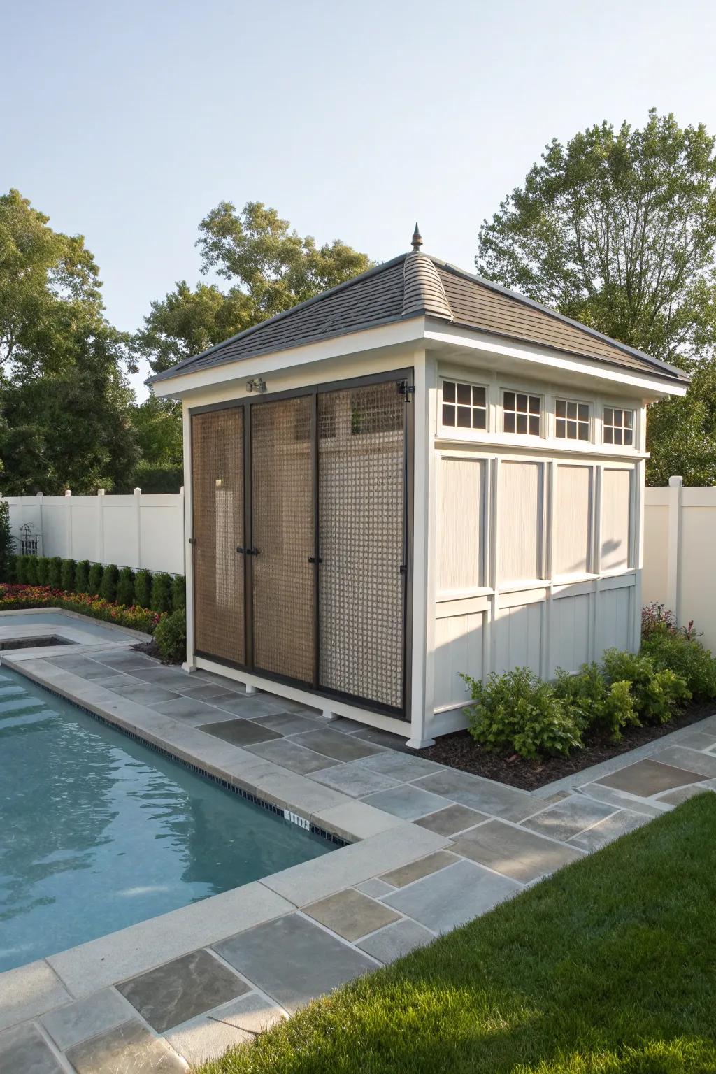 A discreet pool pump house with an elegant privacy screen.