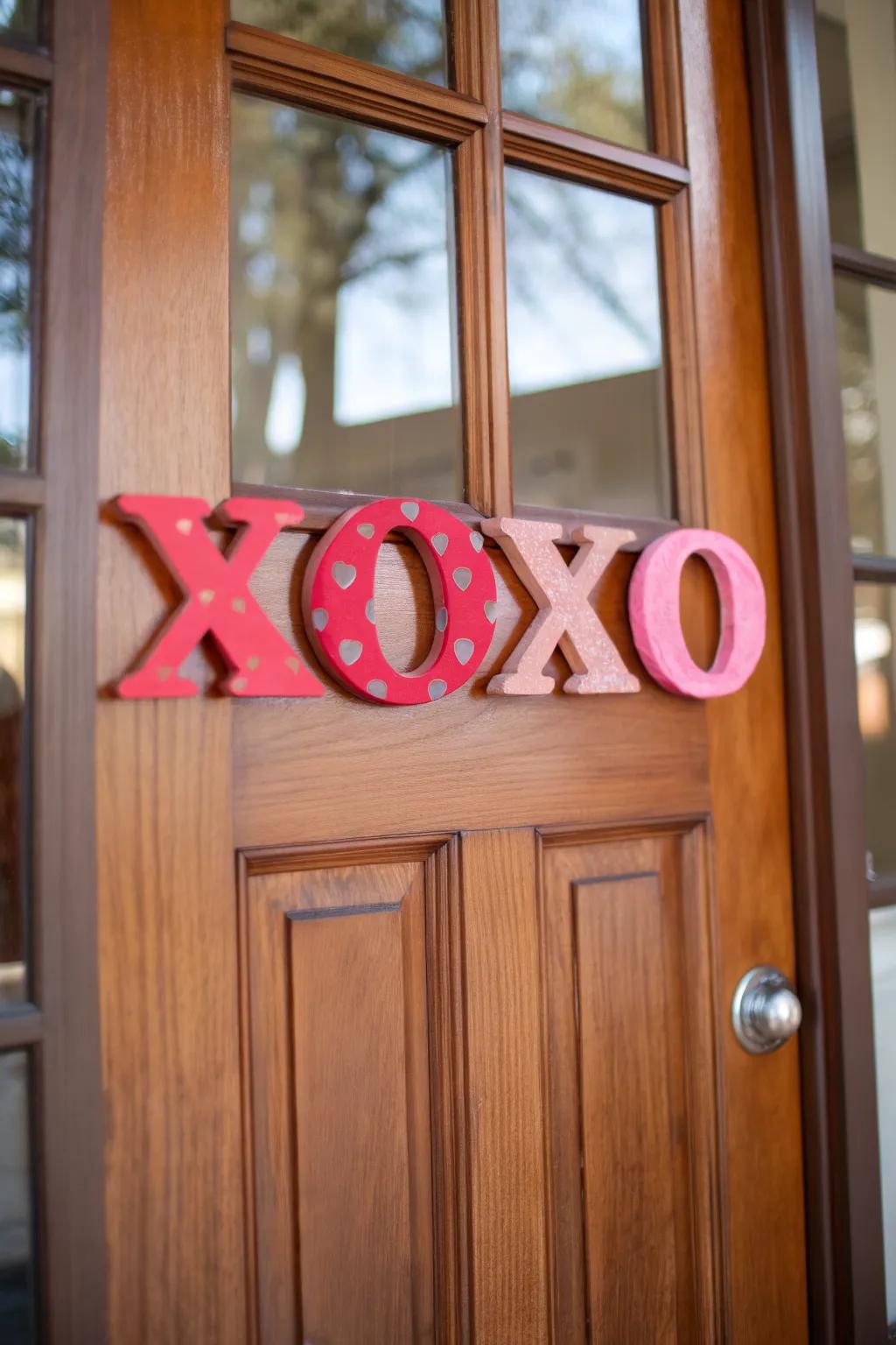 'XOXO' adds a playful and whimsical touch to your Valentine's door.