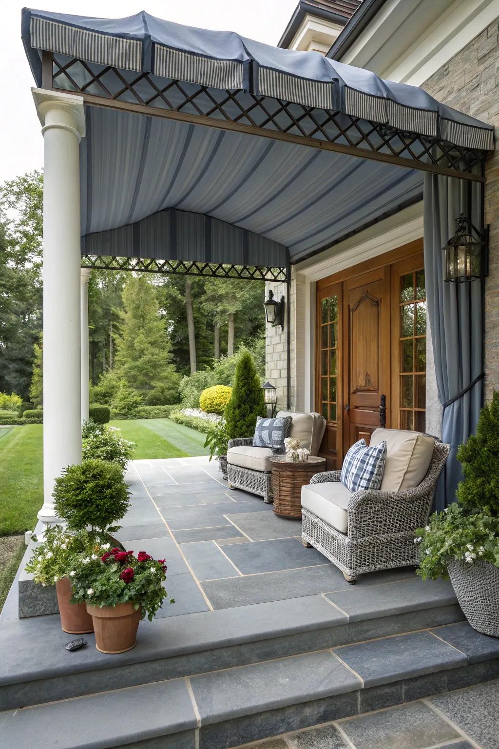A bluestone porch shaded by a chic canopy.