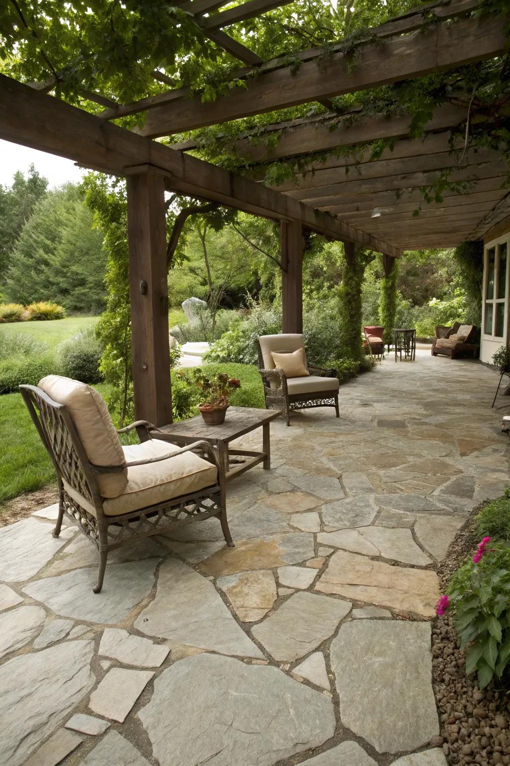 Enjoy a cozy retreat with flagstone under a pergola.
