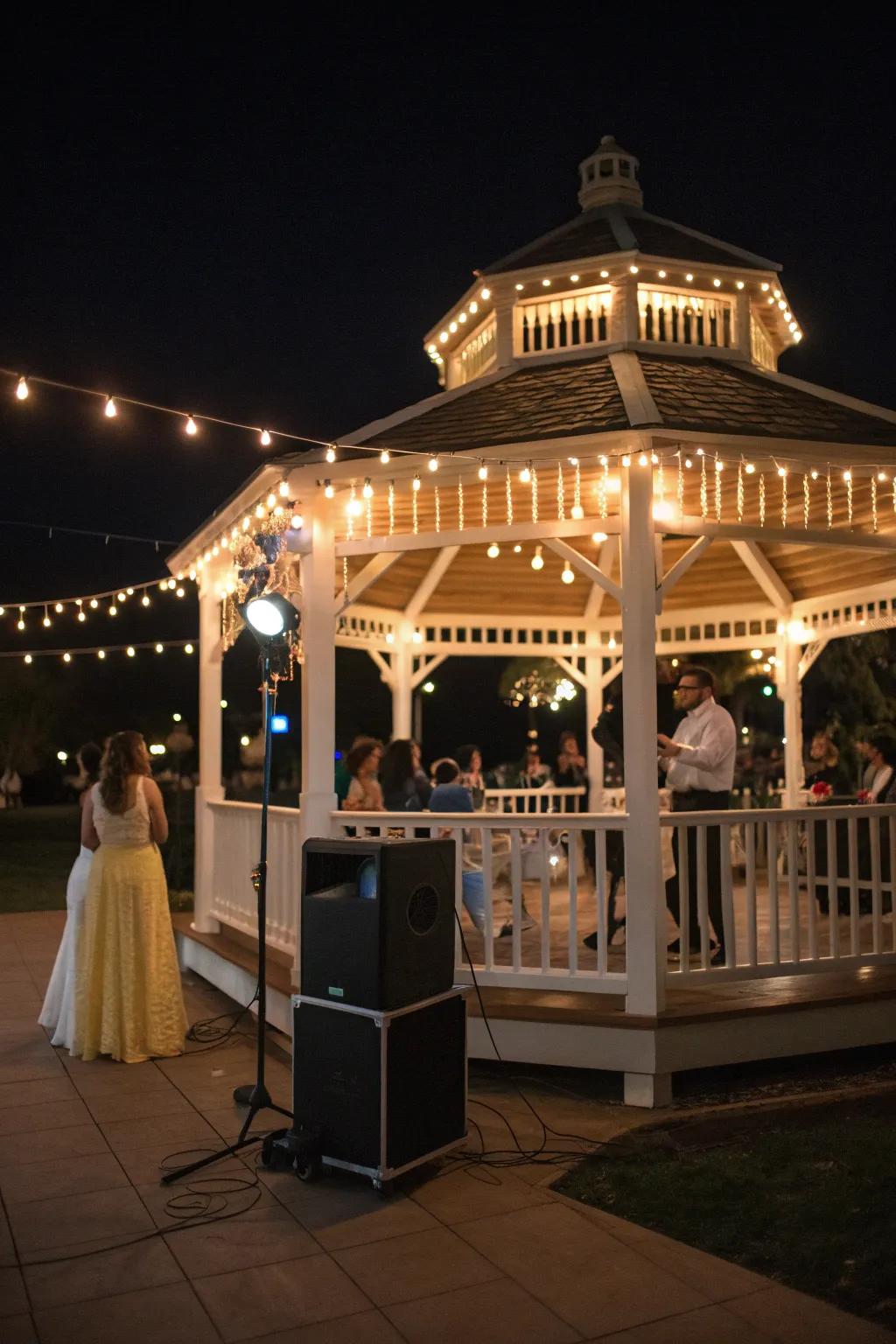 Music adding a lively atmosphere to a gazebo party under the stars.