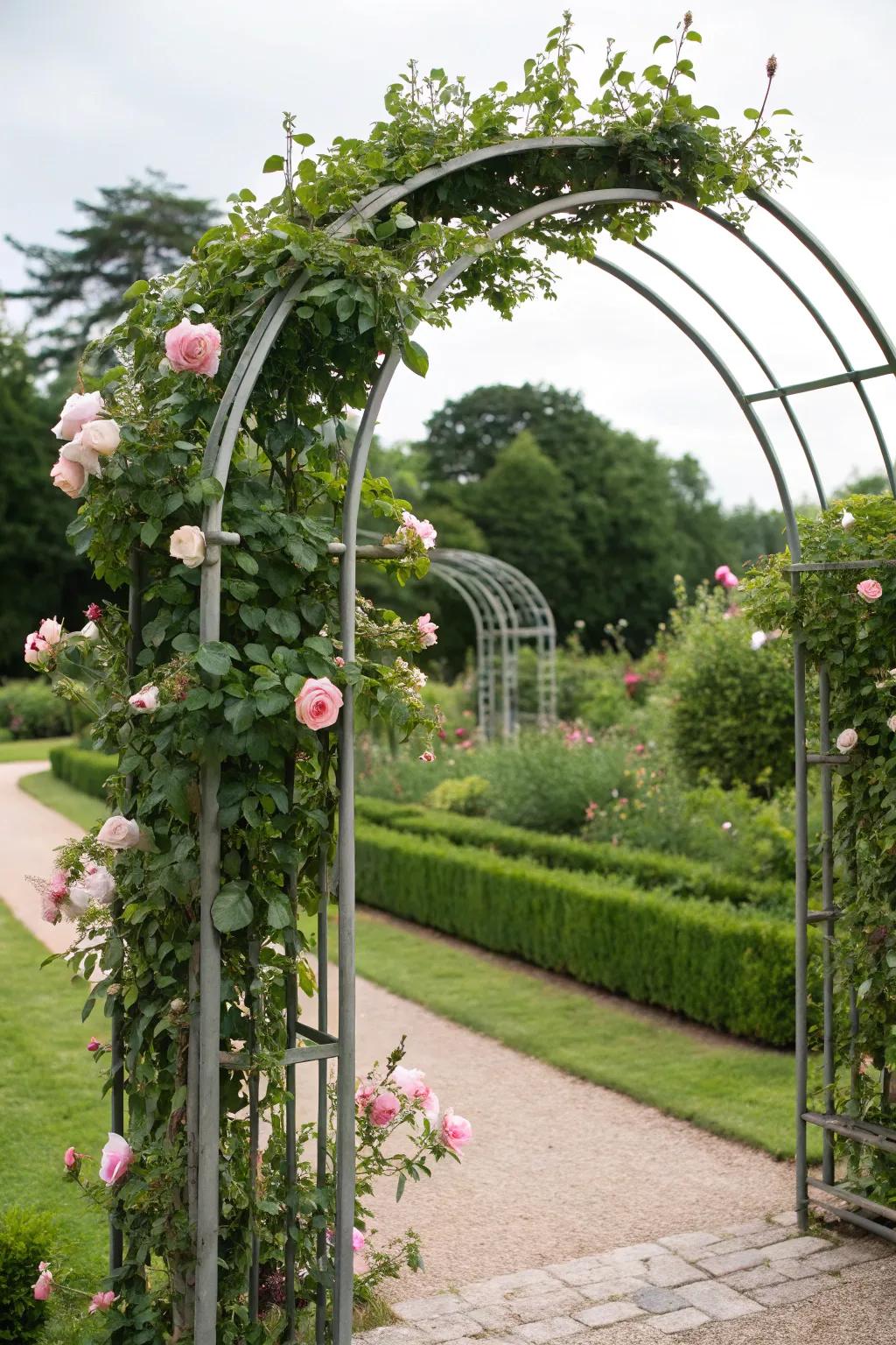 Create a grand entrance with an elegant metal arch draped in roses.