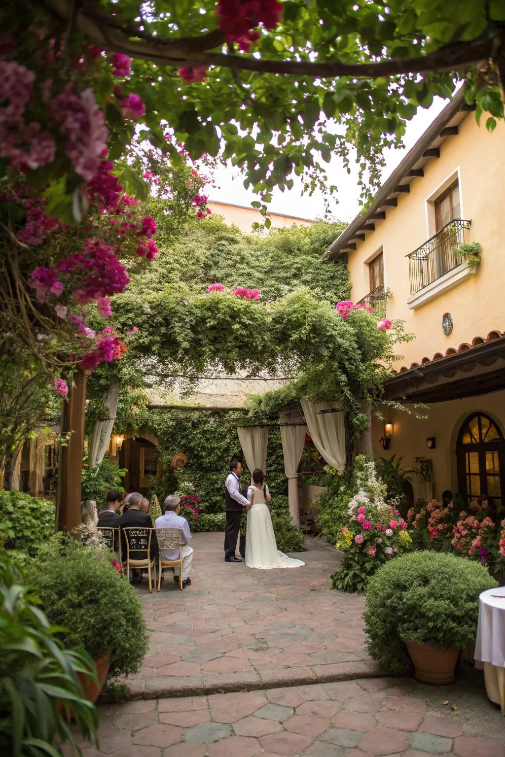 Nature's beauty frames this stunning courtyard wedding setting.
