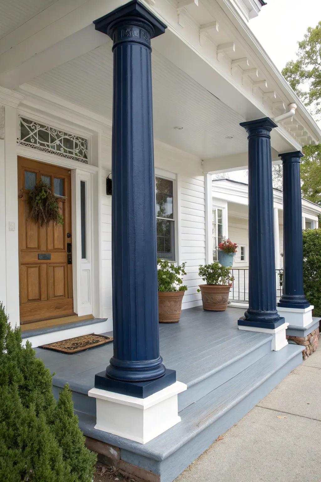 Navy blue columns give a modern edge to this porch.