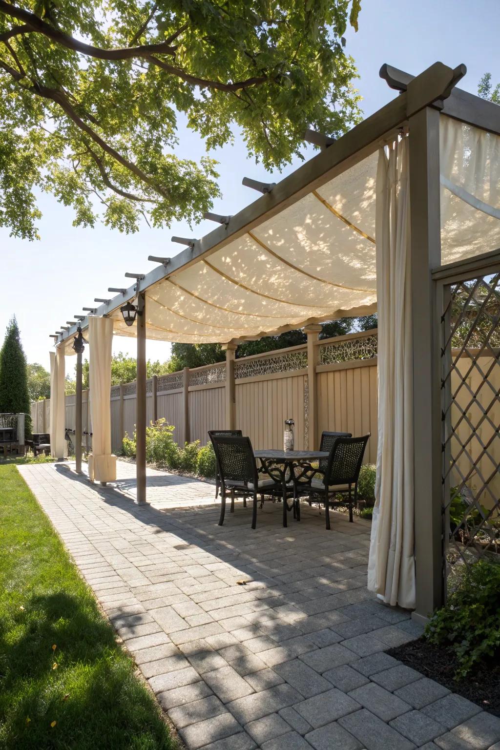Blend structure and shade with a pergola and fabric cover.