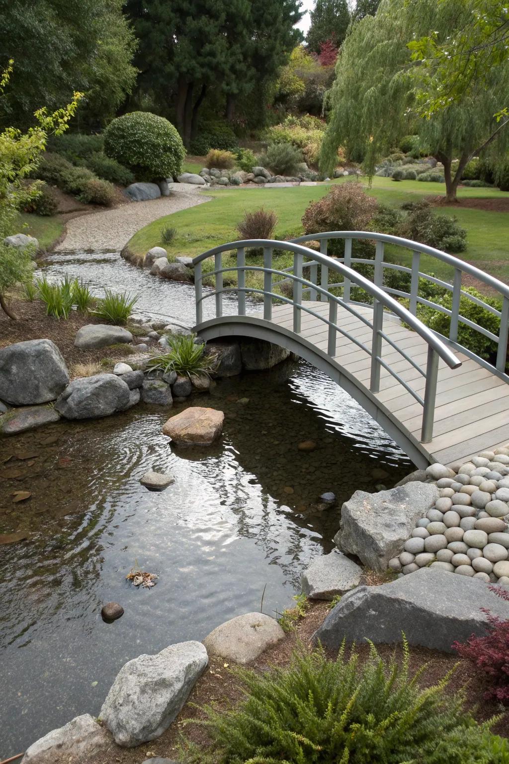 A modern metal bridge adding elegance to a minimalist garden.