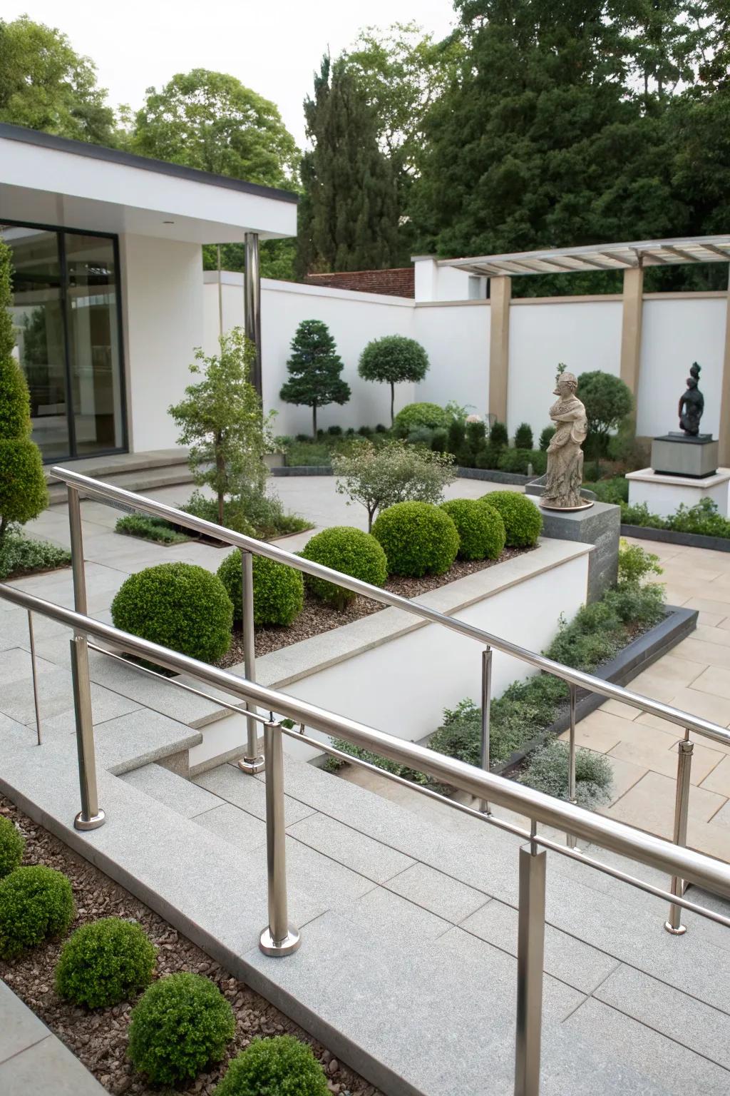 Sleek metal railings add a modern touch to garden spaces.