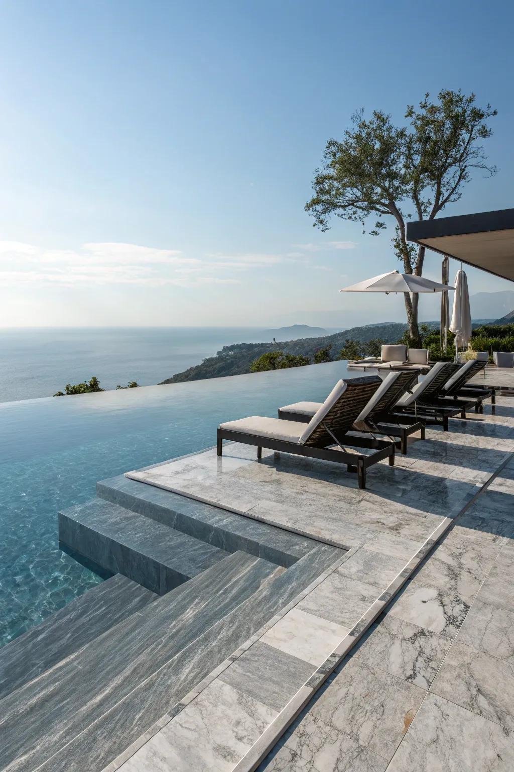 A luxurious infinity pool with pristine marble and contemporary furnishings.