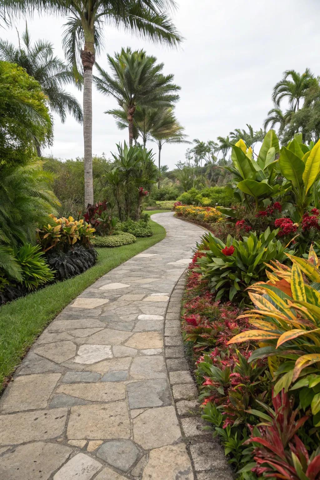 A sleek stone pathway through a tropical garden.