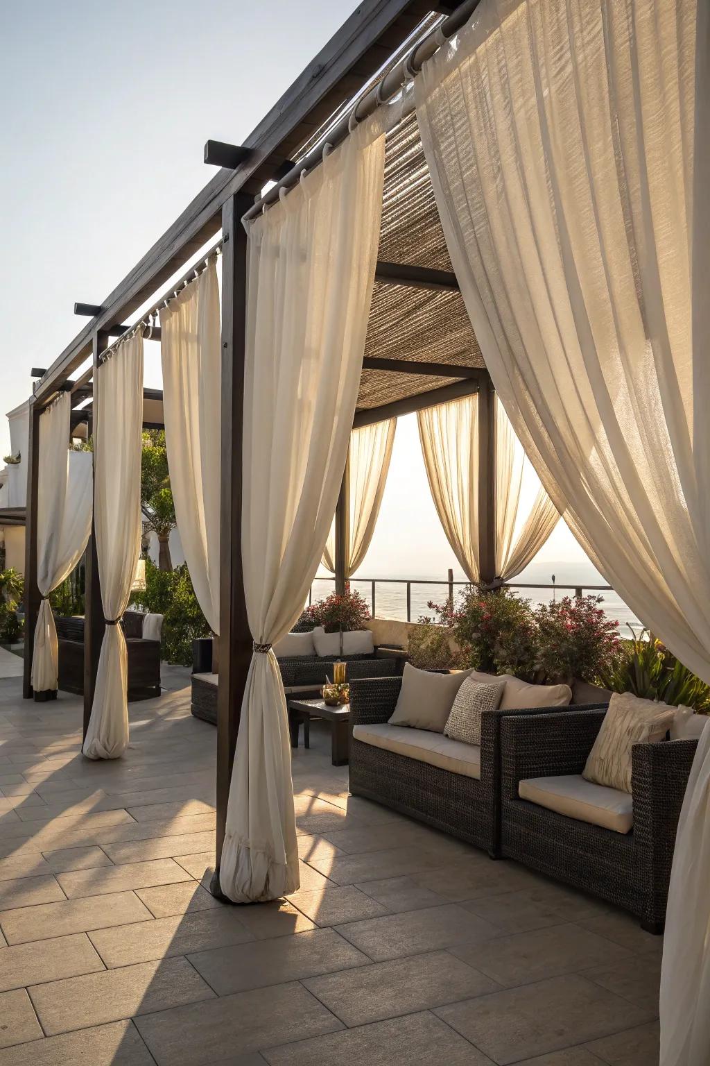 Outdoor curtains provide privacy and a touch of romance.