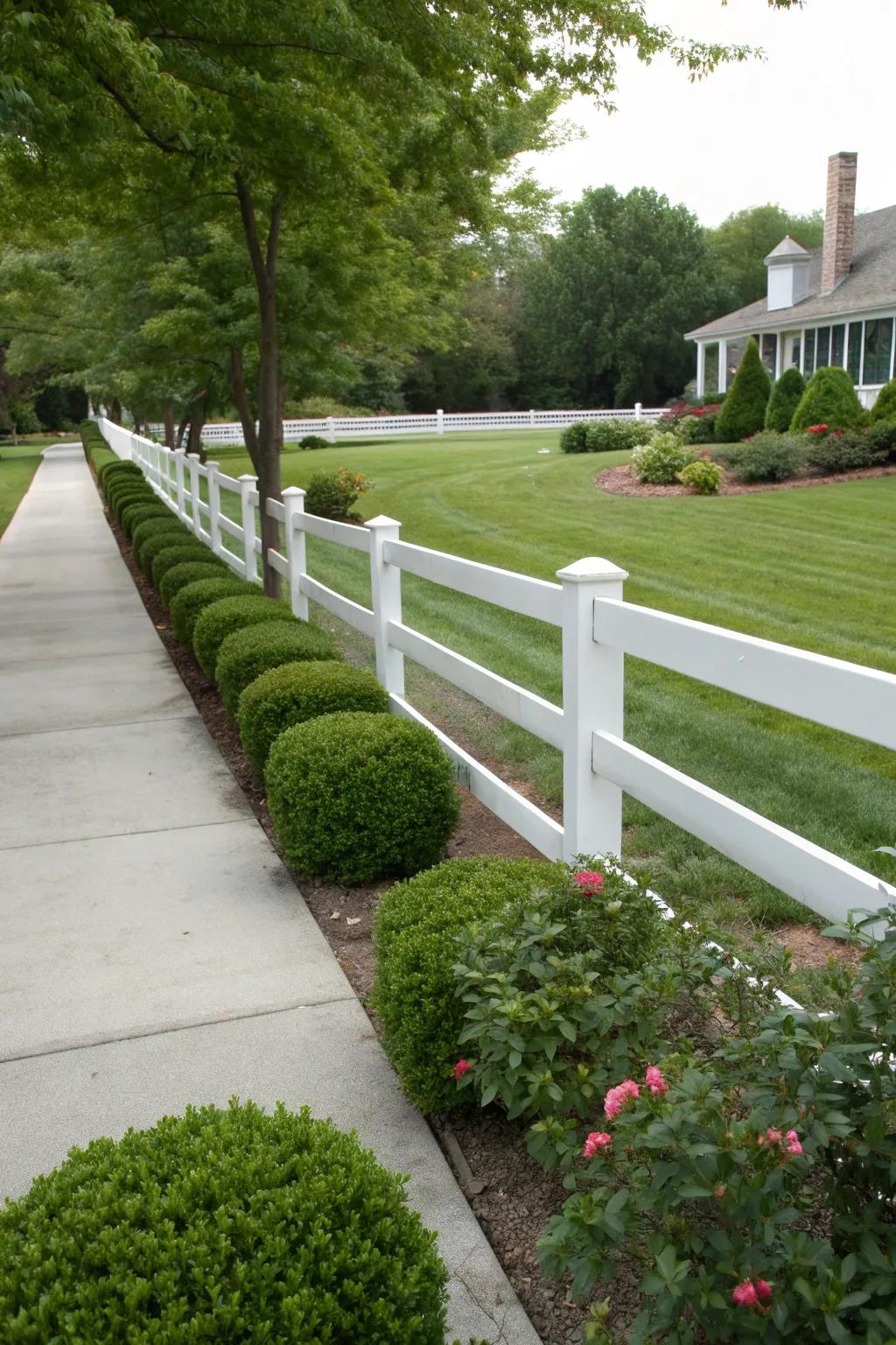 A white painted fence creates a classic suburban aesthetic.