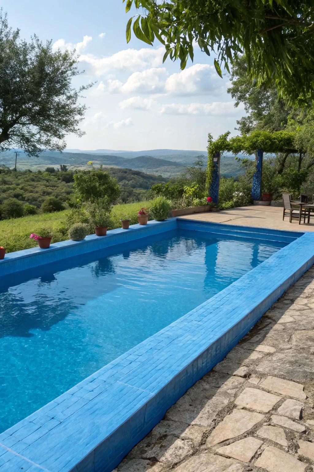 Bold blue coping brings a touch of the ocean to your pool.