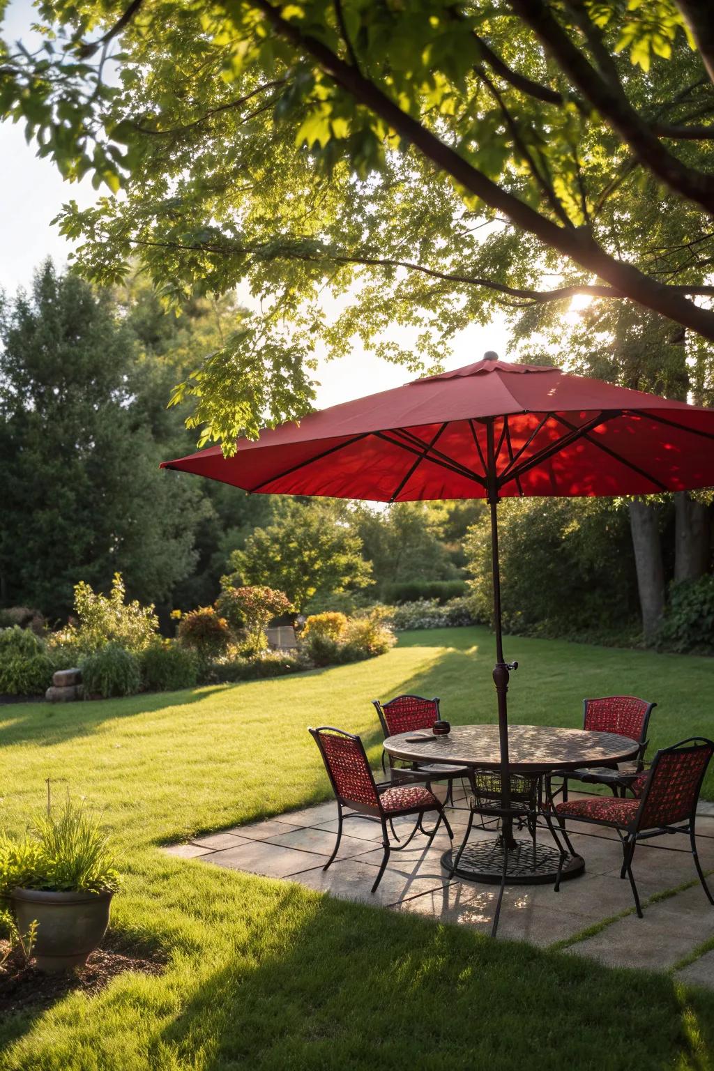 A bold red umbrella creating a striking focal point in the patio.