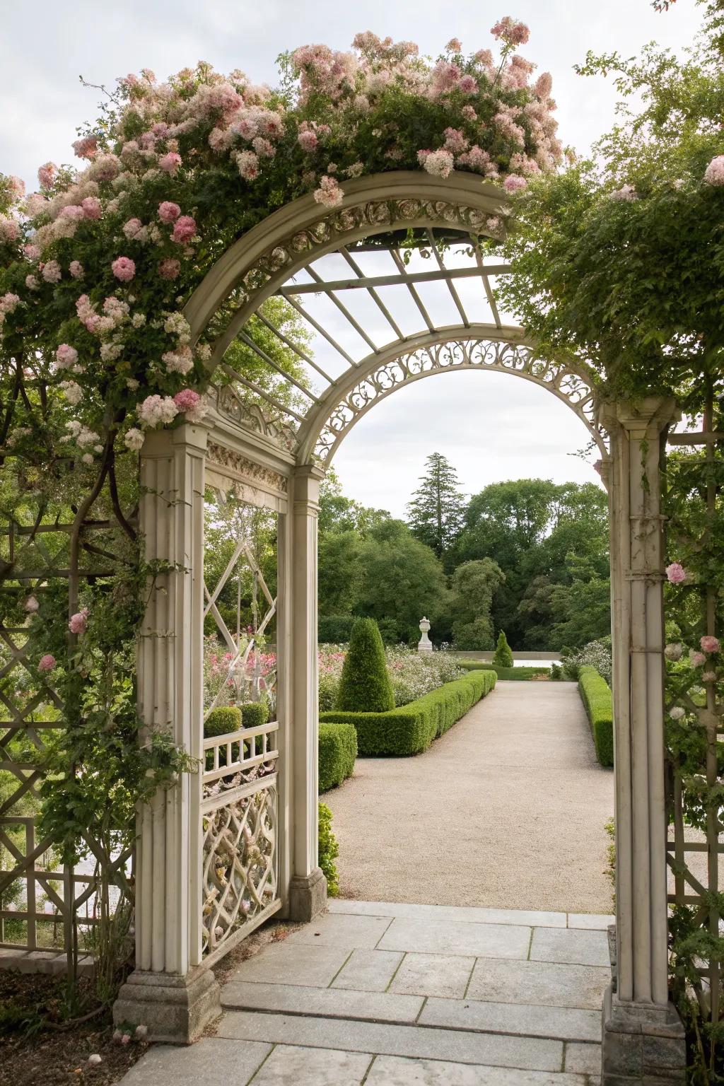 An elegant arched trellis gate adorned with climbing flowers.