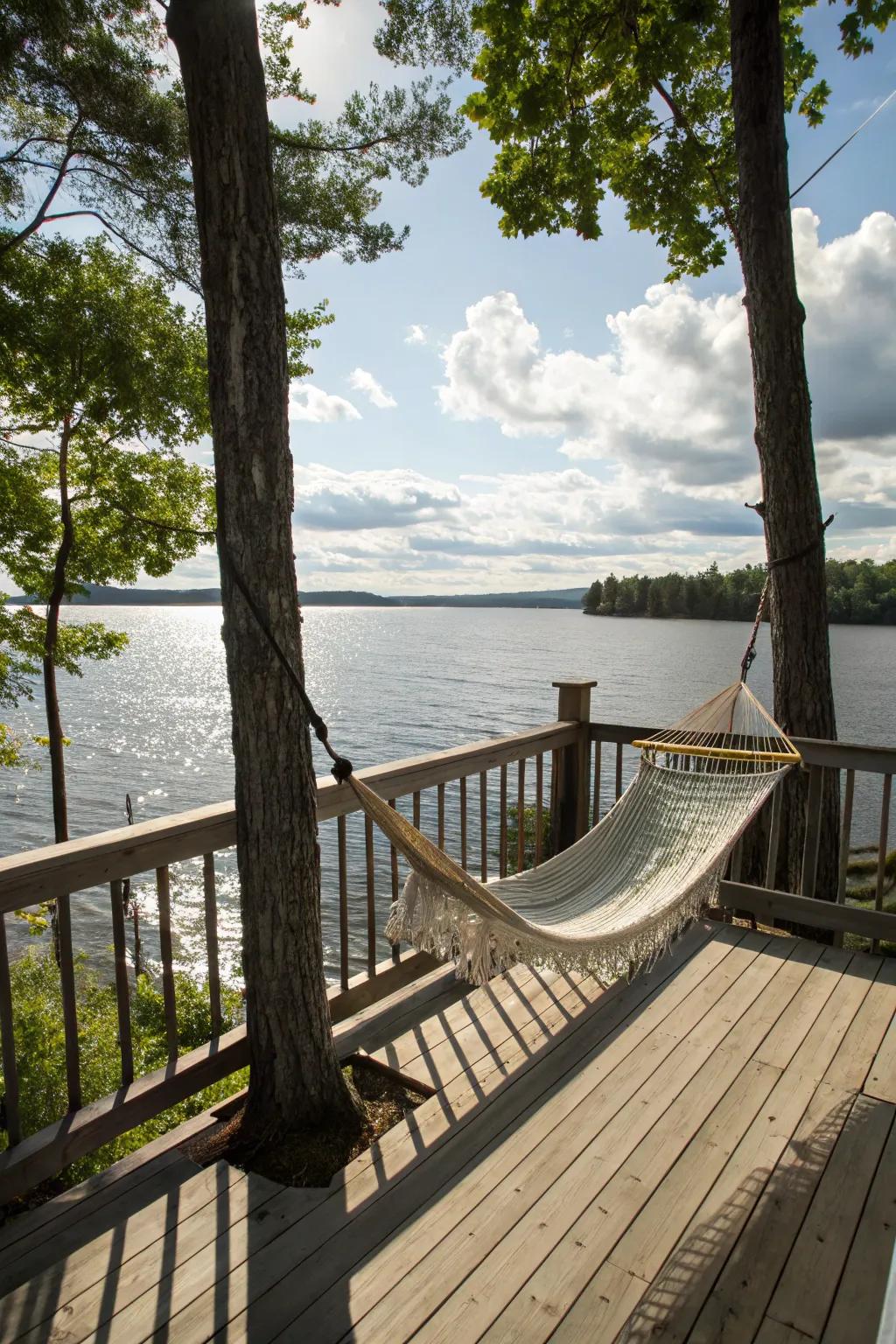 A hammock offers the perfect spot for relaxation on a lakefront deck.