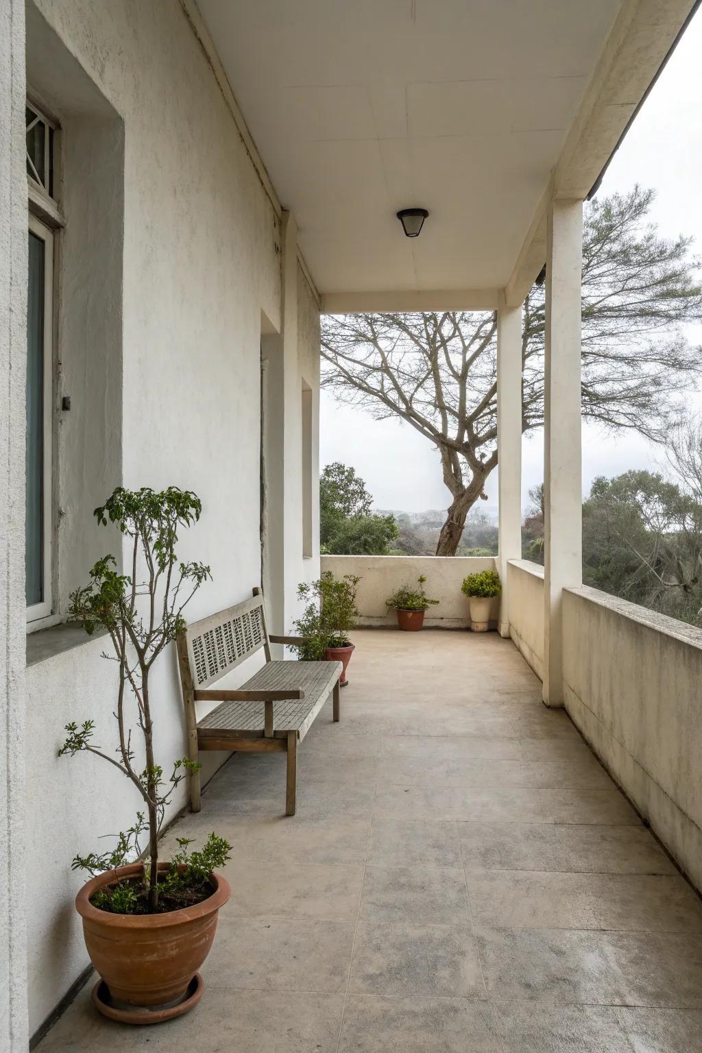 A small concrete porch with minimalist decor and clean lines.